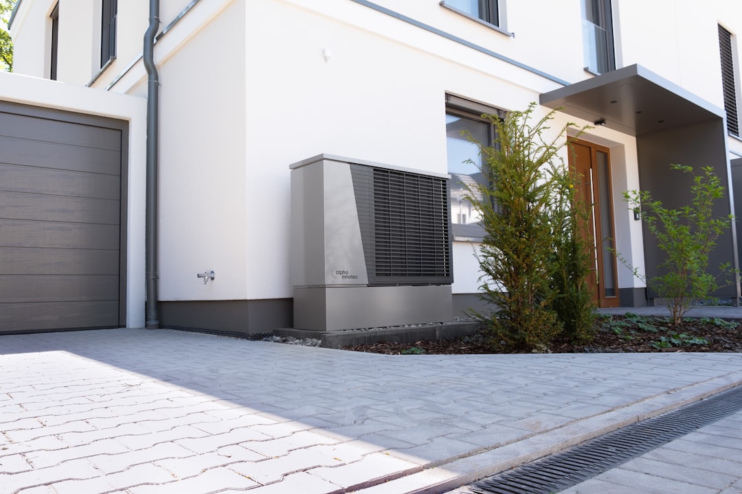 Modern house exterior with heat pump unit