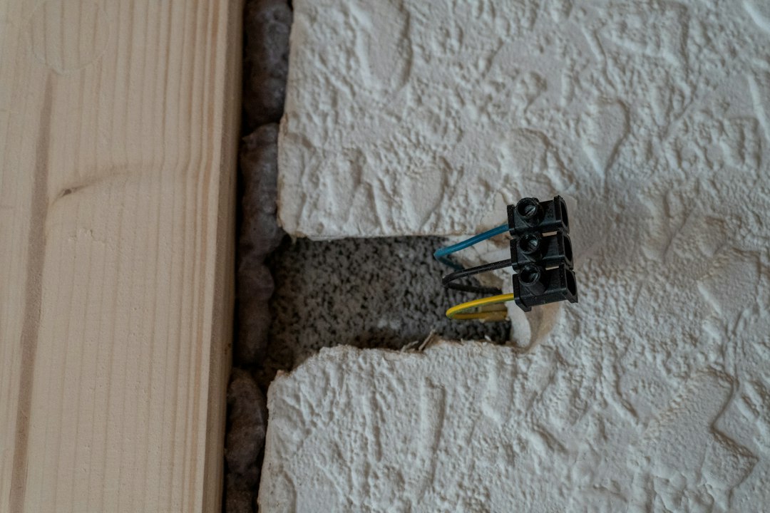 Exposed electrical wires in a textured wall opening